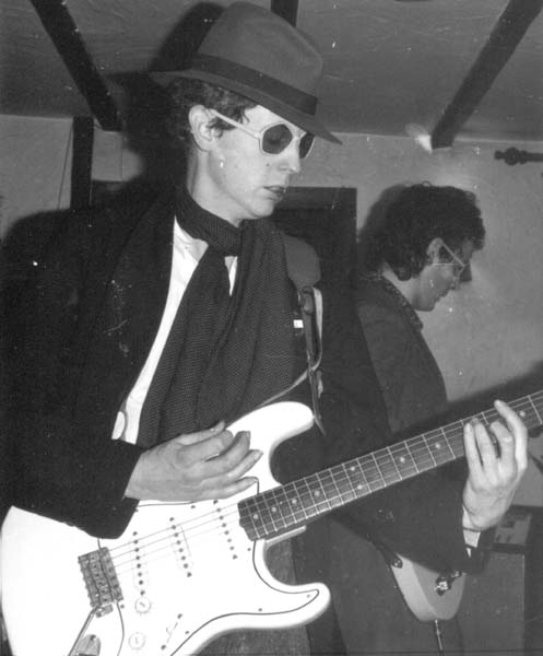 Rich T Bizkid on guitar