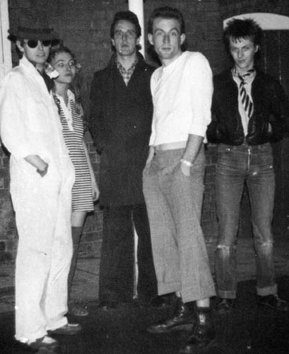 grainy black and white print of the original band line up