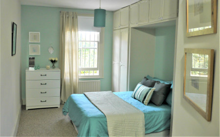 green, cyan and grey bedroom